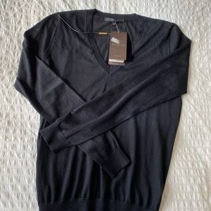 Cleaning my closet. Gucci black sweater size M. Brand new with tag.